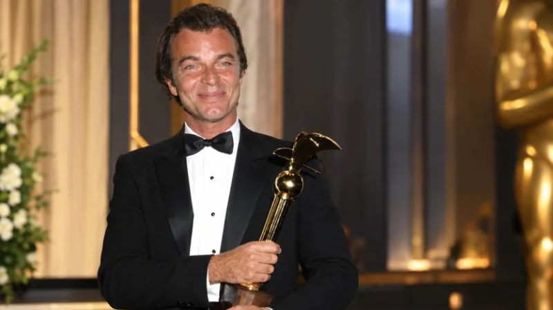 Golden Globe Award representing Edward Albert's 1973 win
