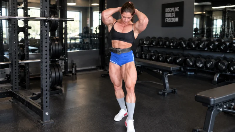 Vladislava Galagan posing in a gym to show her muscle definition