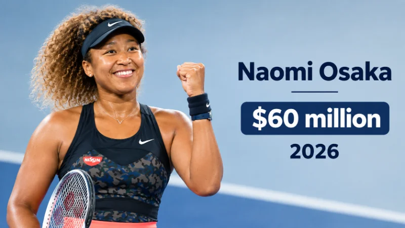 Naomi Osaka serving during a night match at a hard-court tournament